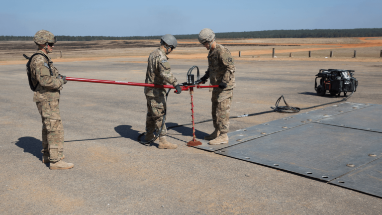 Soldiers repairing air runway